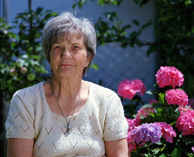 older woman in garden