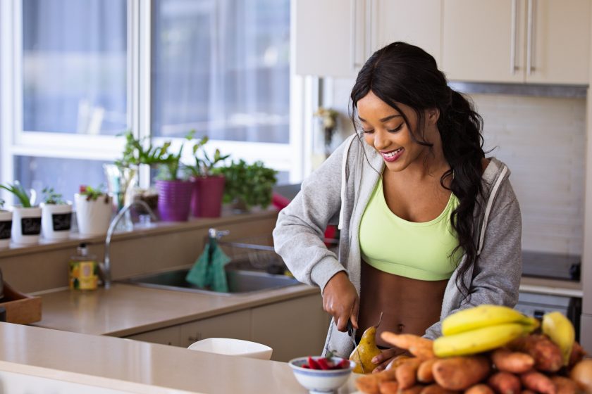 woman cutting healthy food