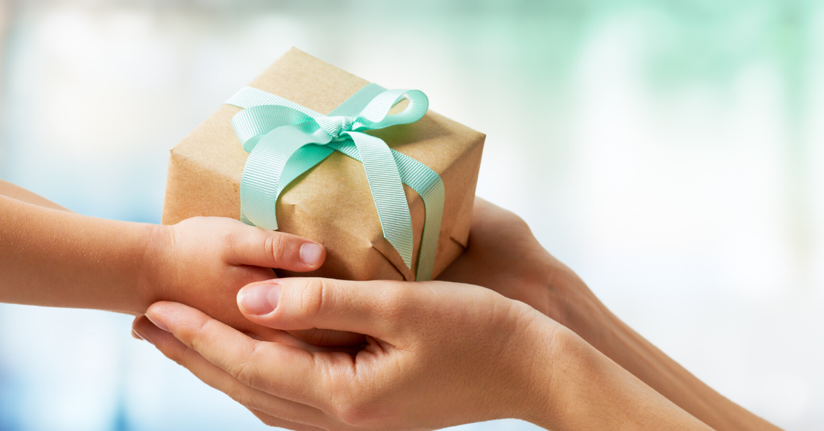 two hands with gift